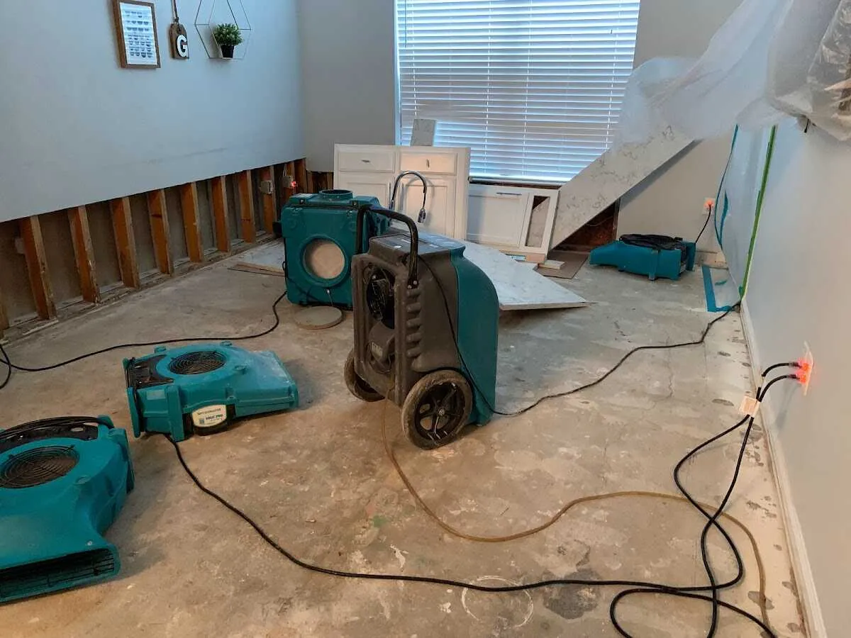 Dehumidifier in flood-cut room for Water Damage Restoration in Winthrop Town